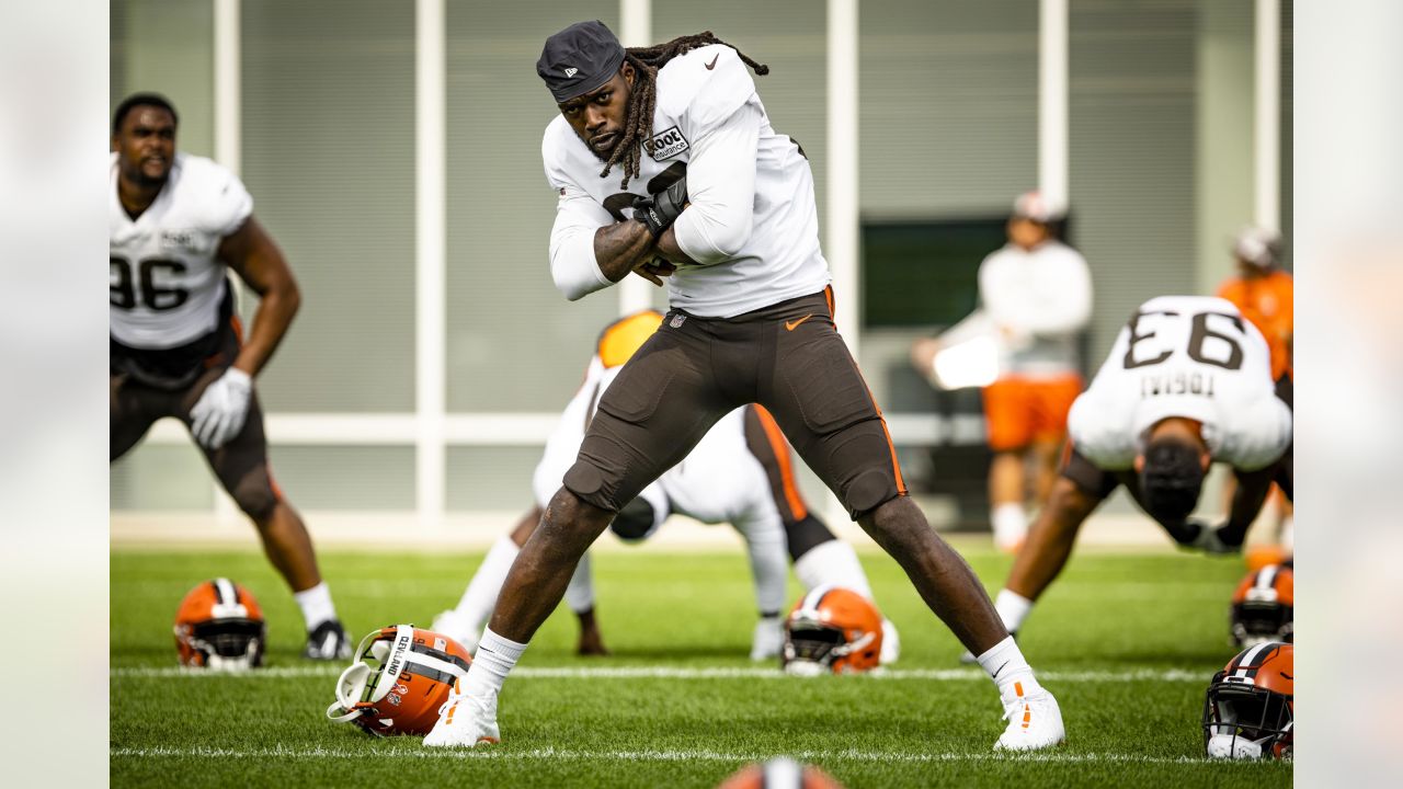 Cleveland Browns offensive tackle James Hudson III (66) walks back to the  line of scrimmage during