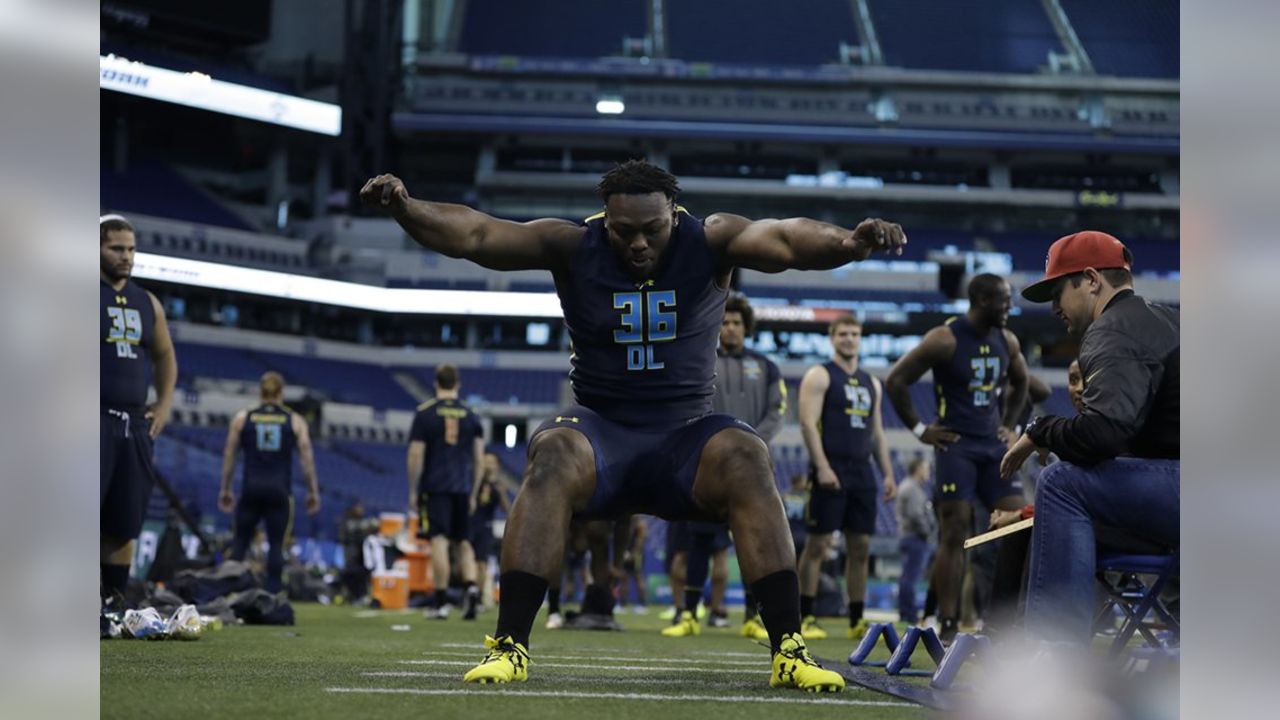 Larry Ogunjobi squatting over 700 pounds - Sports Illustrated