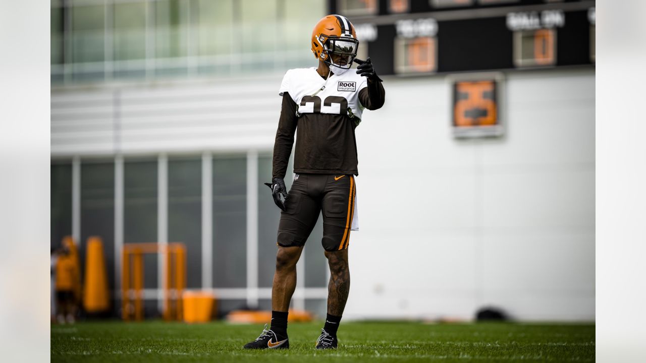 Cleveland Browns offensive tackle James Hudson III (66) walks back