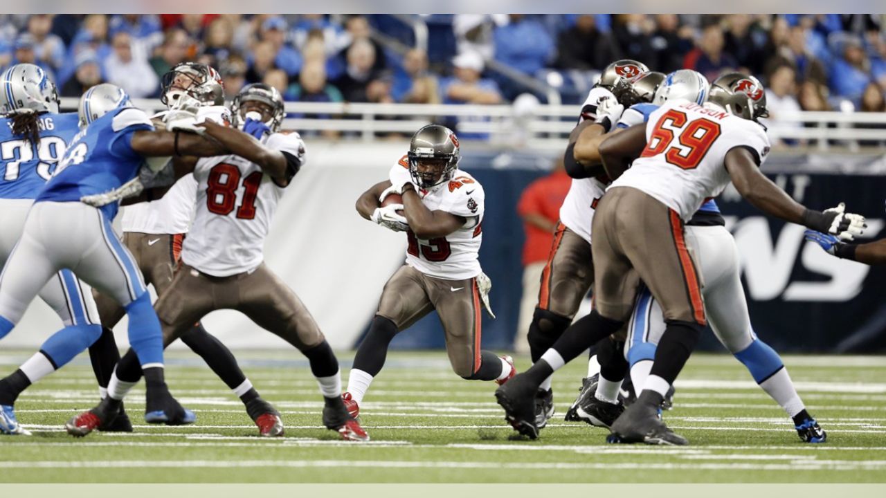 Detroit Lions defensive back D.J. Hayden (31) picks up a fumble and take it  to the end zone for a touchdown after Detroit Lions outside linebacker  Tahir Whitehead (59) sacks Chicago Bears