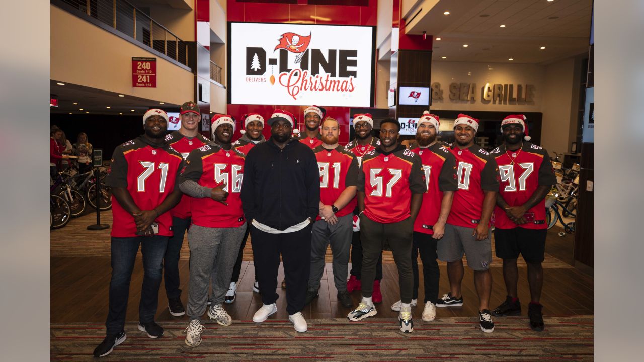 Bucs D-Line delivers special Christmas for kids