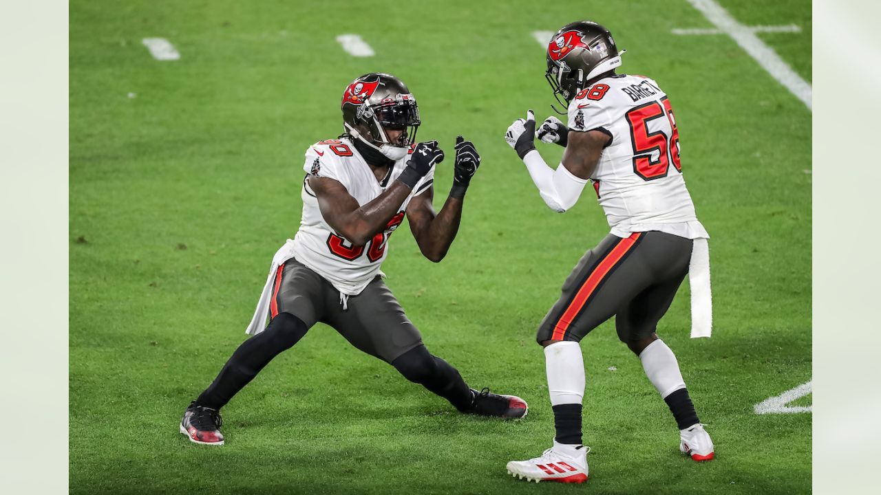 Tampa Bay Buccaneers outside linebacker Jason Pierre-Paul (90) celebrates a  turnover during a NFL divisional playoff football game against the Los  Angeles Rams, Sunday, January 23, 2022 in Tampa, Fla. (AP Photo/Alex