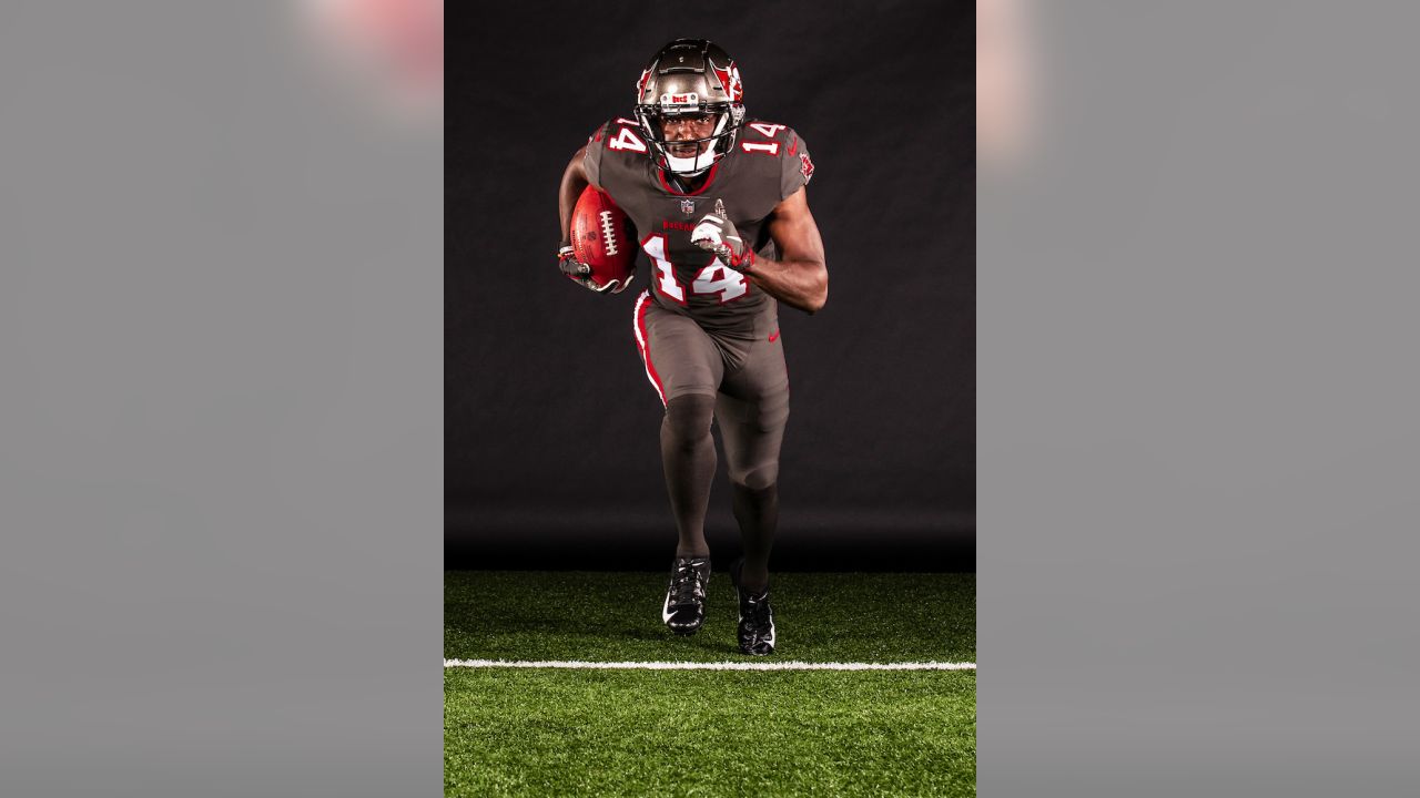 Bucs beat Broncos, look good doing it in new all-pewter uniforms