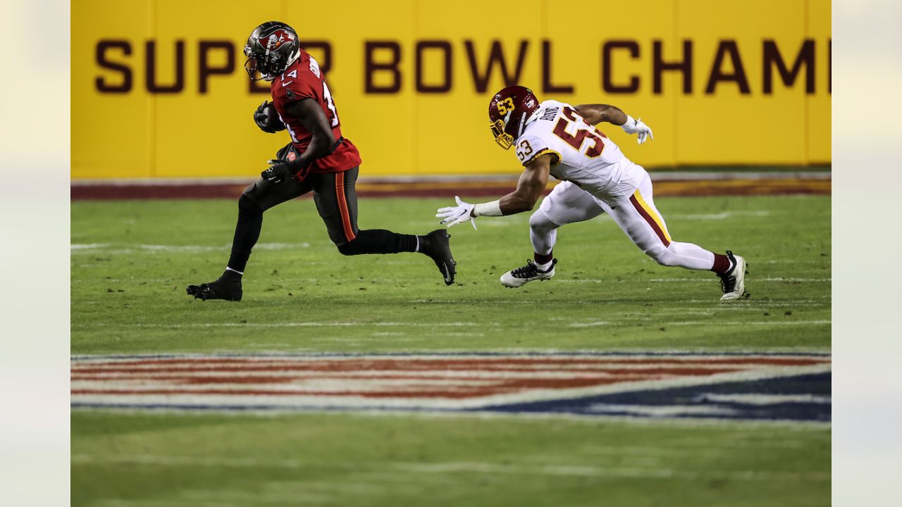 Tom Brady, Buccaneers hold off Washington for victory in NFC wild-card  round - The Boston Globe