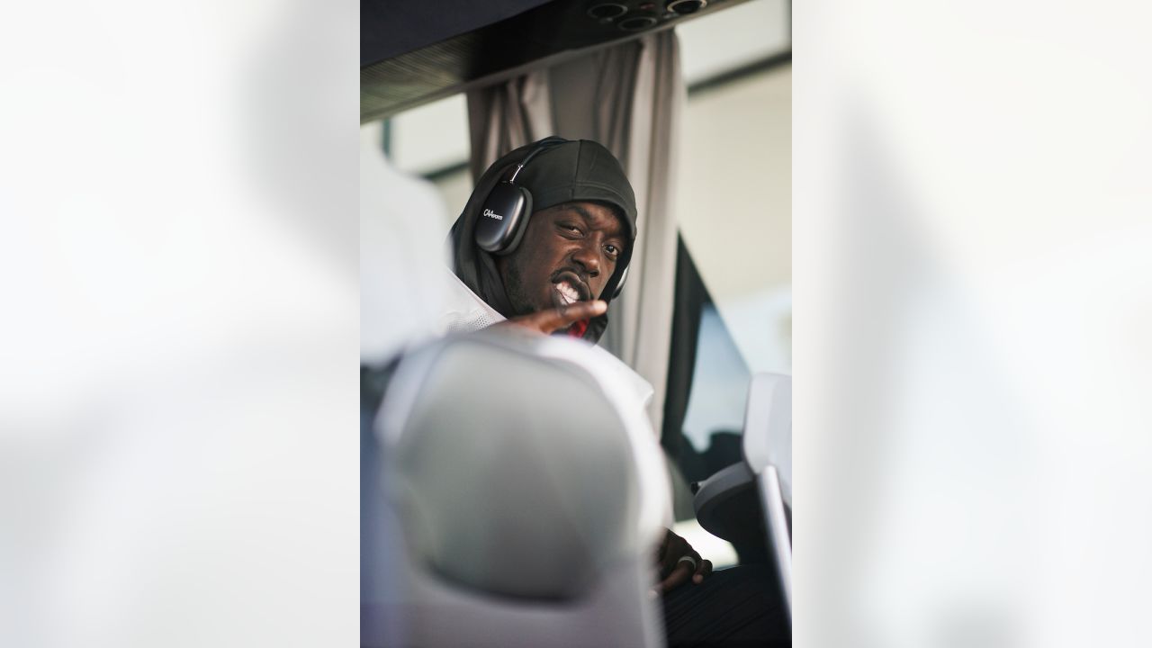 Tampa Bay Buccaneers defensive tackle Rakeem Nunez-Roches (56) with a smart  phone celebrating after an NFL football game against the Seattle Seahawks  on Nov. 13, 2022, in Munich. The Buccaneers defeated the