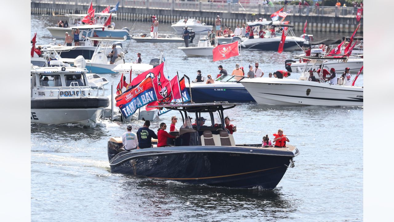 Tampa Bay Buccaneers quarterback Tom Brady and his son Benjamin ride his  boat during a celebration of their Super Bowl 55 victory over the Kansas  City Chiefs with a boat parade, Wednesday