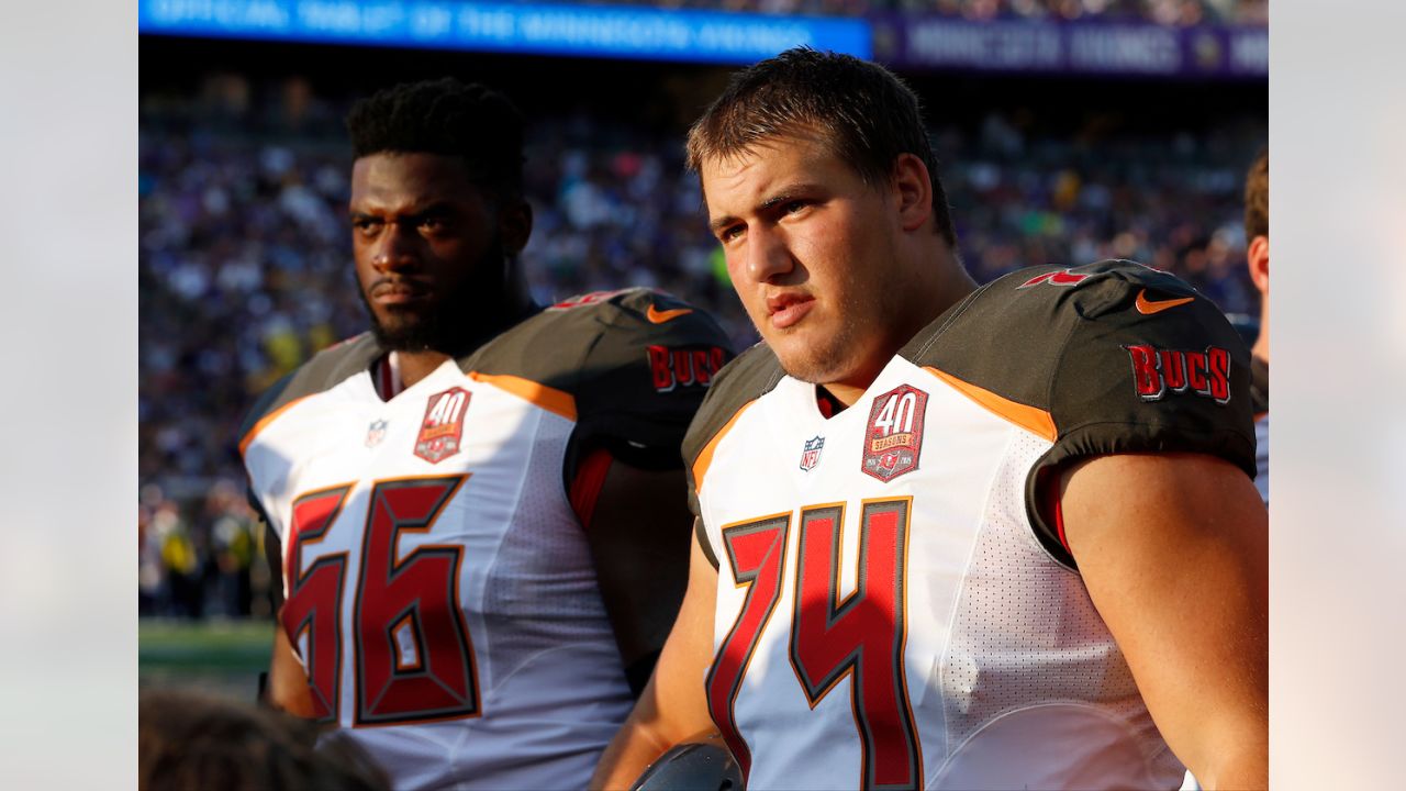 Tampa Bay Buccaneers guard John Molchon (75) walks to the locker