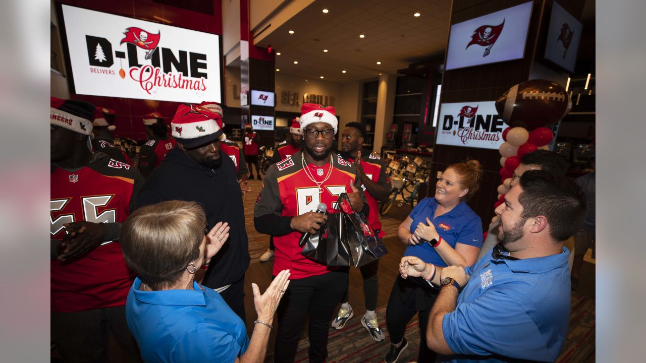 Bucs D-Line delivers special Christmas for kids