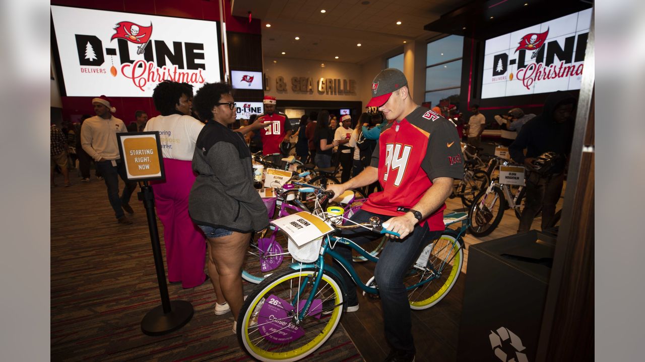 Bucs D-Line delivers special Christmas for kids