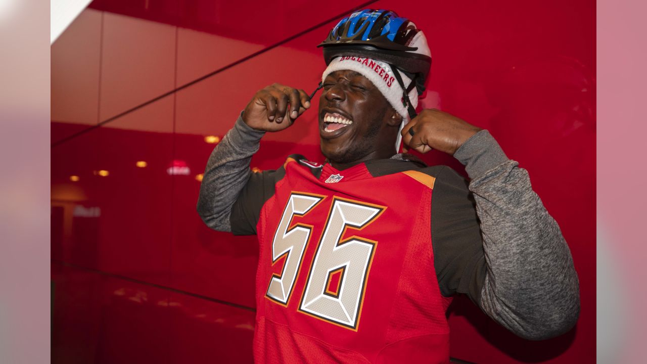 Bucs D-Line delivers special Christmas for kids