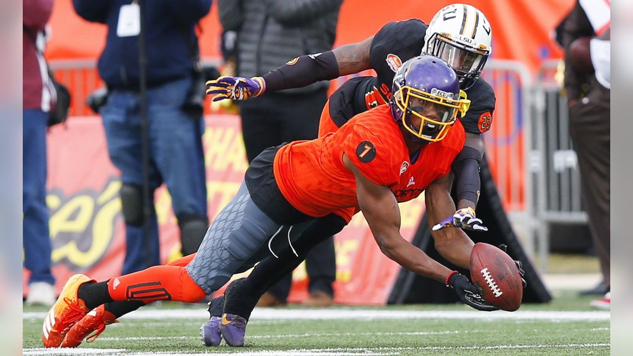 South squad running back Donnel Pumphrey of San Diego State, center is  tackled during the first half of the Senior Bowl NCAA college football game  against North, Saturday, Jan. 28, 2017, at