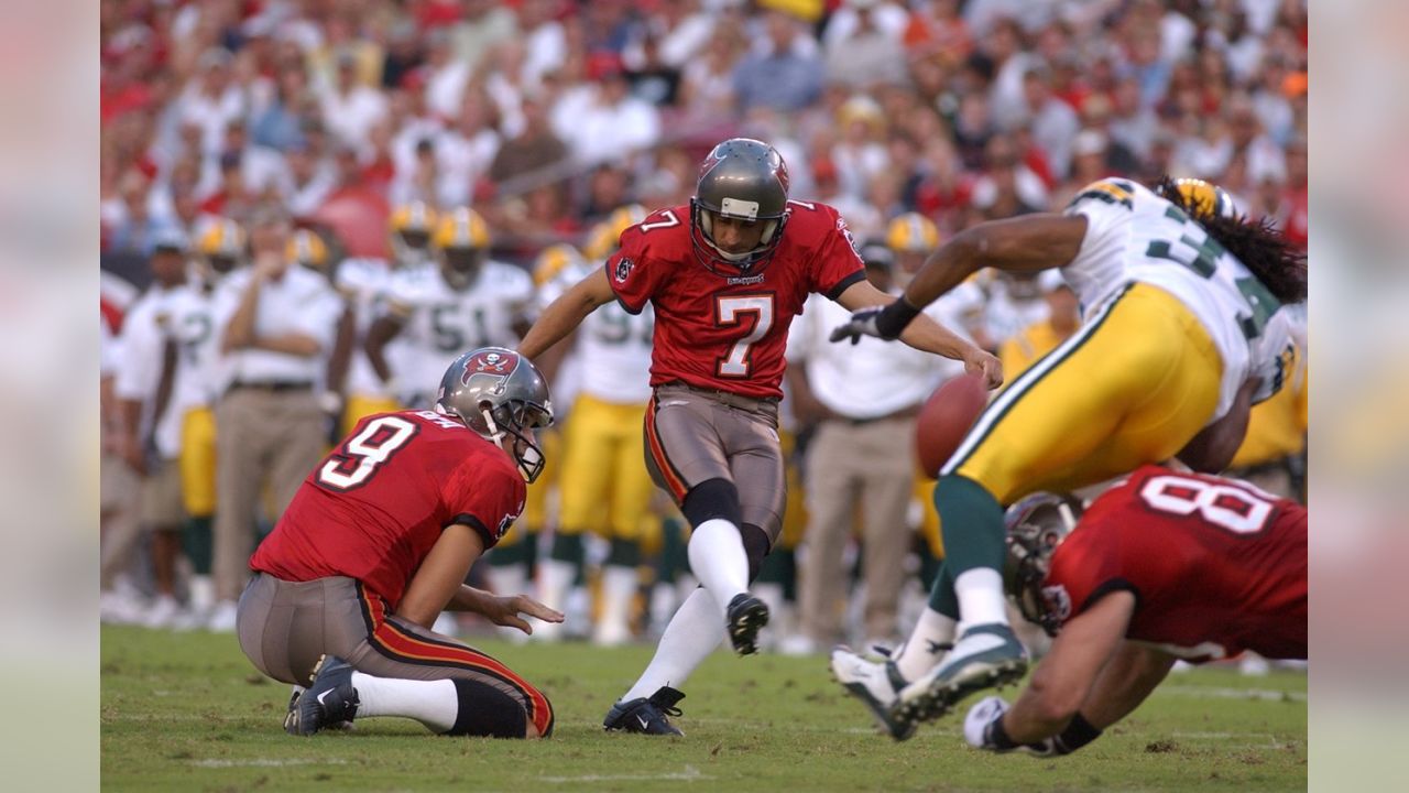 Martin Gramatica of the Tampa Bay Buccaneers runs with the ball News  Photo - Getty Images