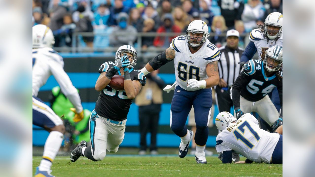 Carolina Panthers defensive end Wes Horton (96) grabs a fumble by