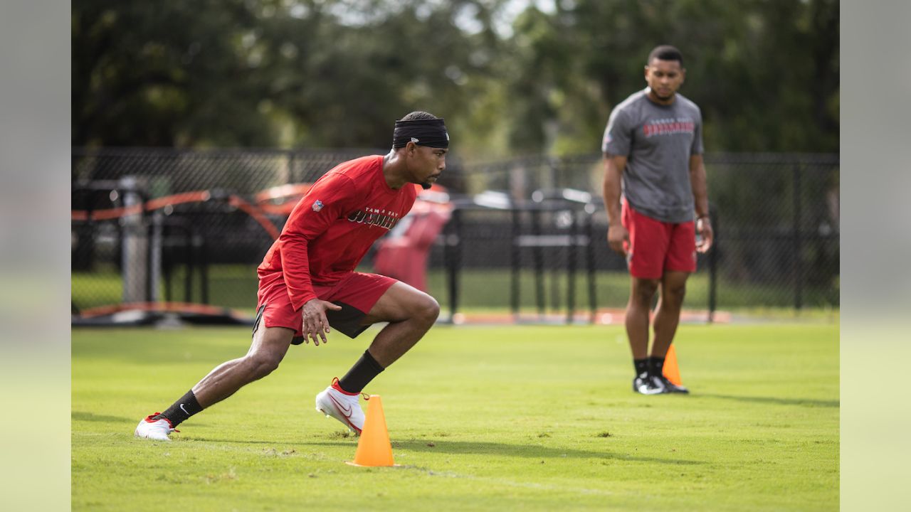 Watch: Bucs rookie Tristan Wirfs shows off insane strength by jumping out  of a pool