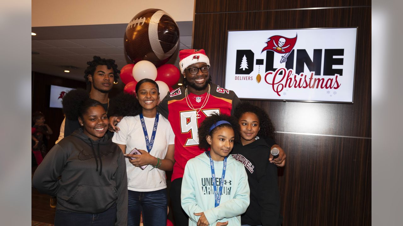 Bucs D-Line delivers special Christmas for kids