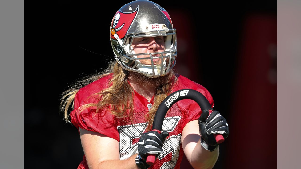 Tampa Bay Buccaneers guard Alex Cappa (65) reacts to the snap during a NFL  divisional playoff f …