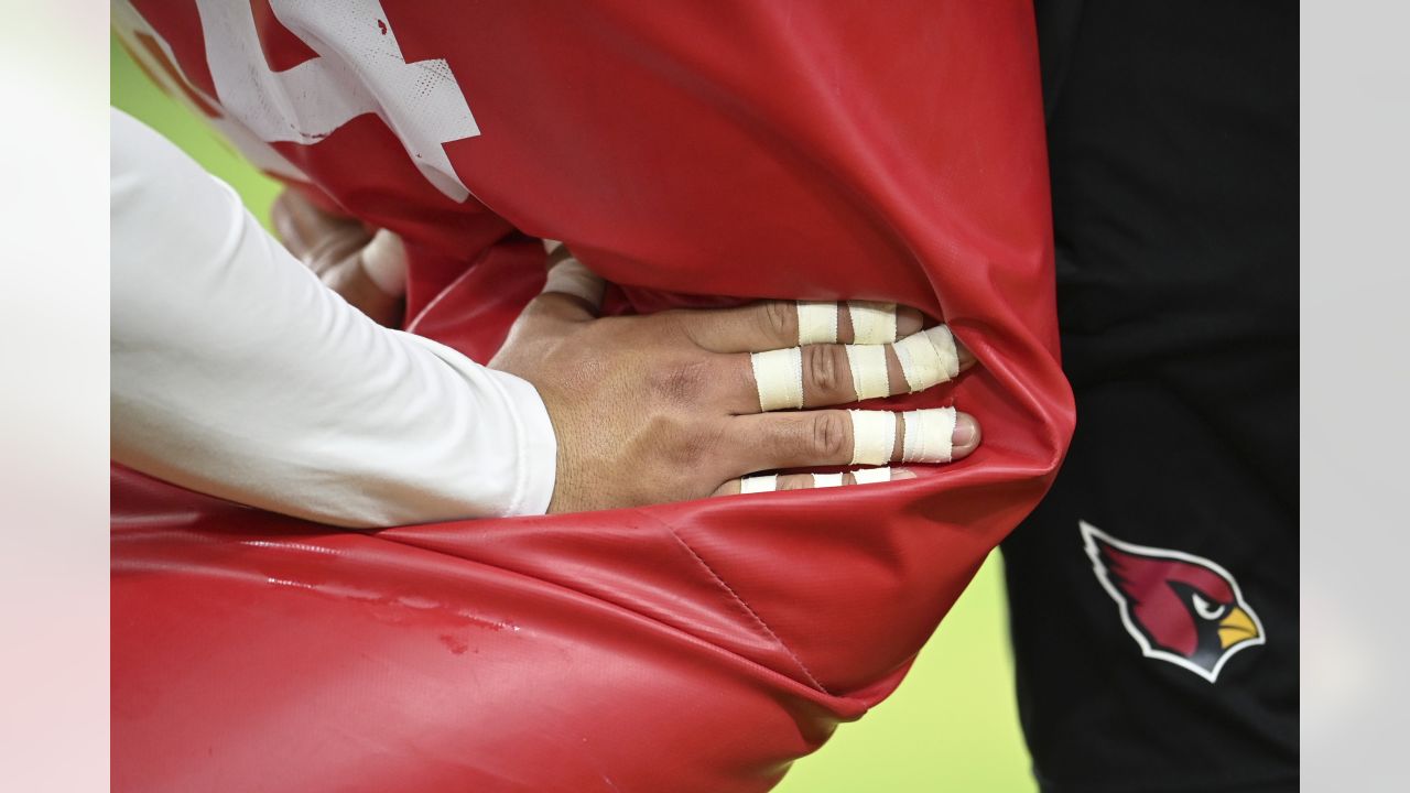 Arizona Cardinals wide receiver Rondale Moore pauses on the sideline during  mini camp practice at the team's NFL football training facility Tuesday,  June 13, 2023, in Tempe, Ariz. (AP Photo/Ross D. Franklin