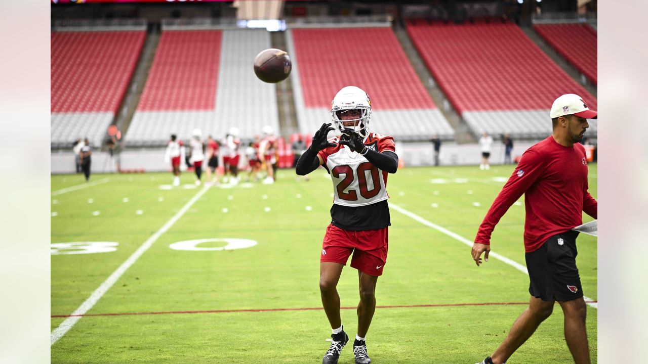 Arizona Cardinals quarterback Colt McCoy puts his helmet on during NFL  football training camp practice at State Farm Stadium Friday, July 28,  2023, in Glendale, Ariz. (AP Photo/Ross D. Franklin Stock Photo 