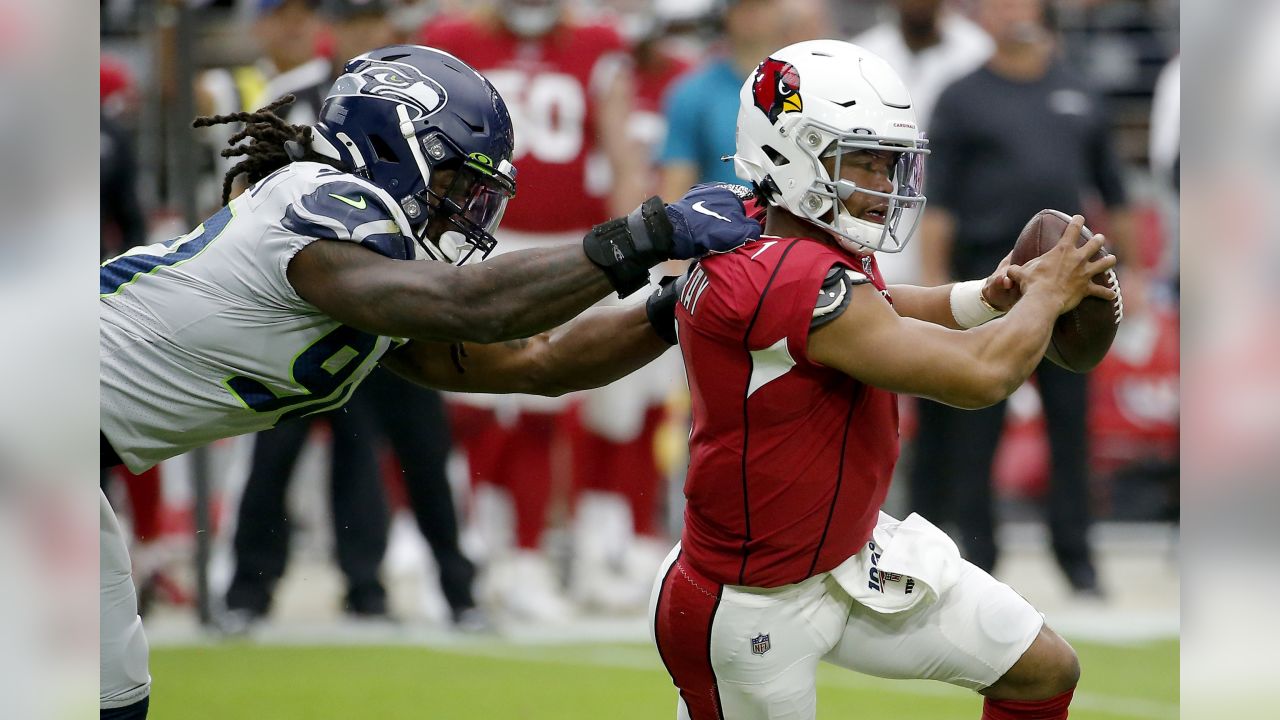 Arizona Cardinals quarterback Kyler Murray (1) scrambles as Seattle  Seahawks defensive end Rasheem Green (98) pursues during the first half of  an NFL football game, Sunday, Sept. 29, 2019, in Glendale, Ariz. (