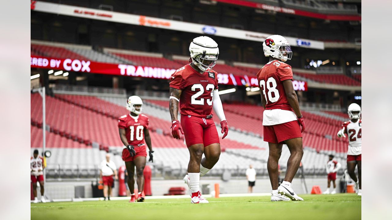 Arizona Cardinals quarterback Colt McCoy puts his helmet on during NFL  football training camp practice at State Farm Stadium Friday, July 28,  2023, in Glendale, Ariz. (AP Photo/Ross D. Franklin Stock Photo 