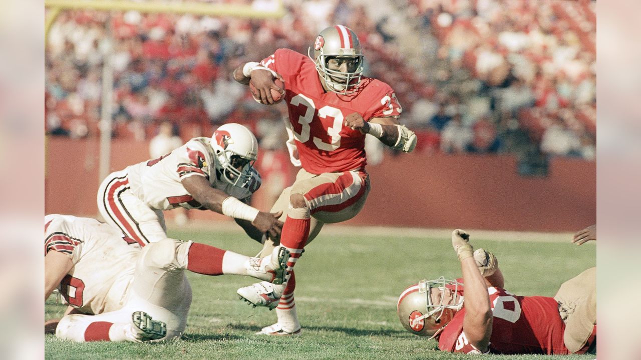 Los Angeles Rams running back Todd Gurley (30) runs for a touchdown against San  Francisco 49ers defensive back Dontae Johnson (36) during the first half of  an NFL football game in Santa