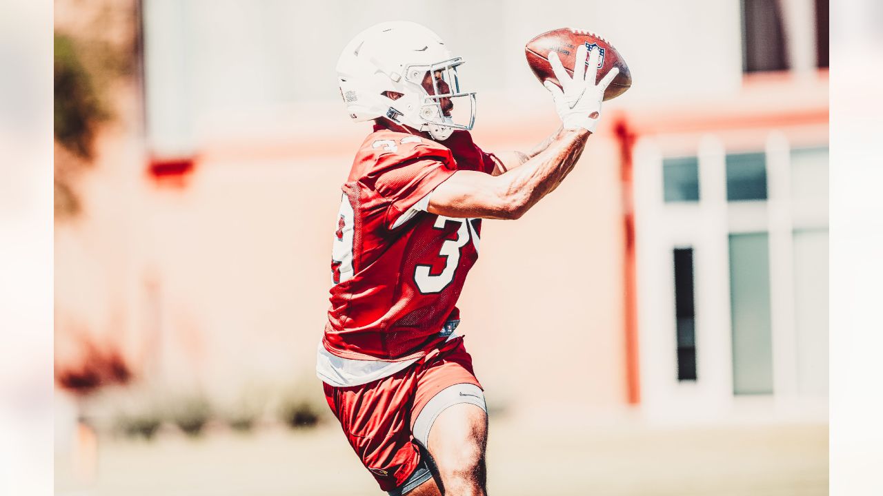 Arizona Cardinals running back Keaontay Ingram morphs into a human joystick  on his slippery 24-yard catch-and-run