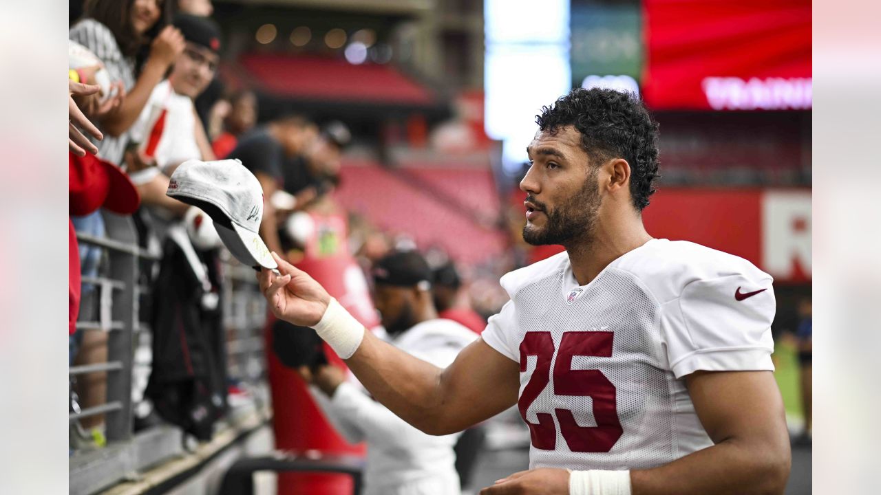 Arizona Cardinals cornerback Quavian White takes a selfie with fans after  NFL football training camp practice as part of Back Together Weekend at  State Farm Stadium Saturday, July 29, 2023, in Glendale