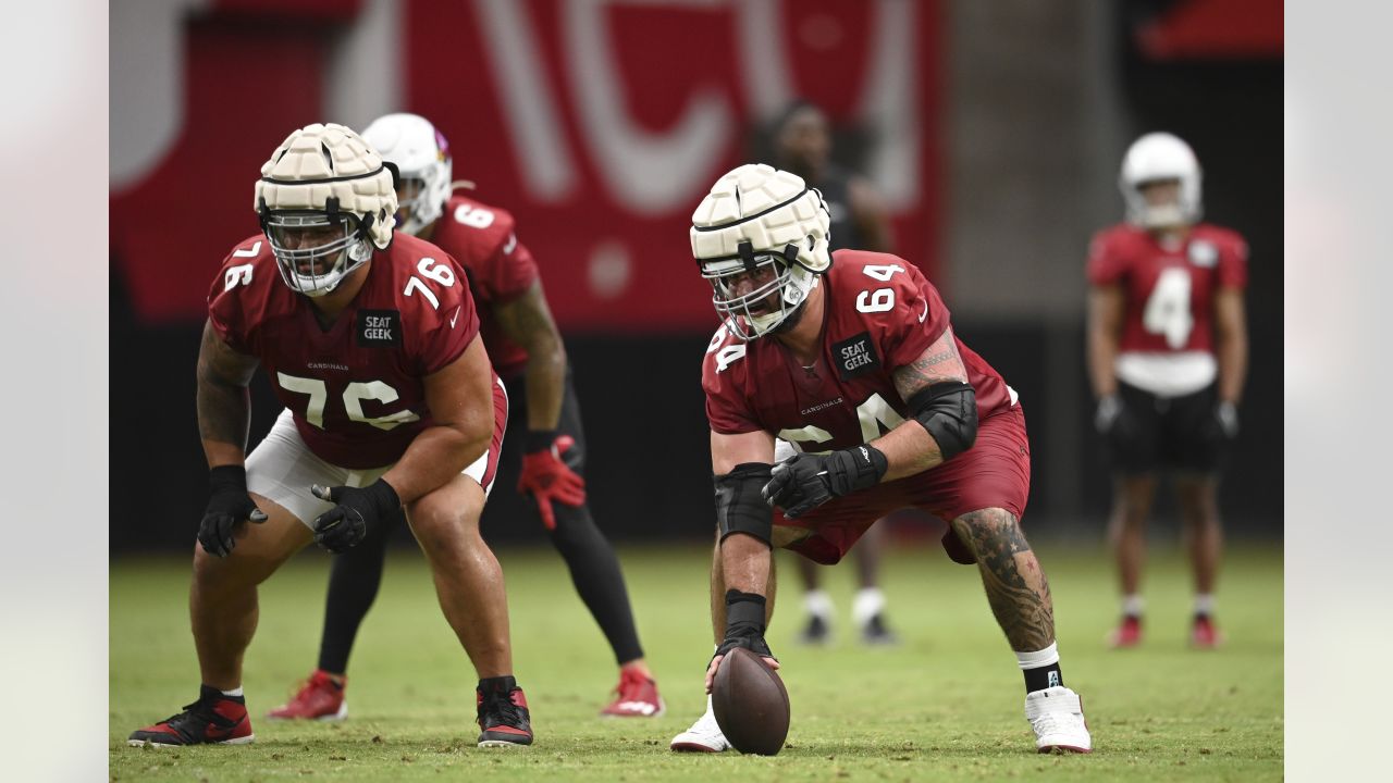 Arizona Cardinals center Sean Harlow (64) with his helmet off