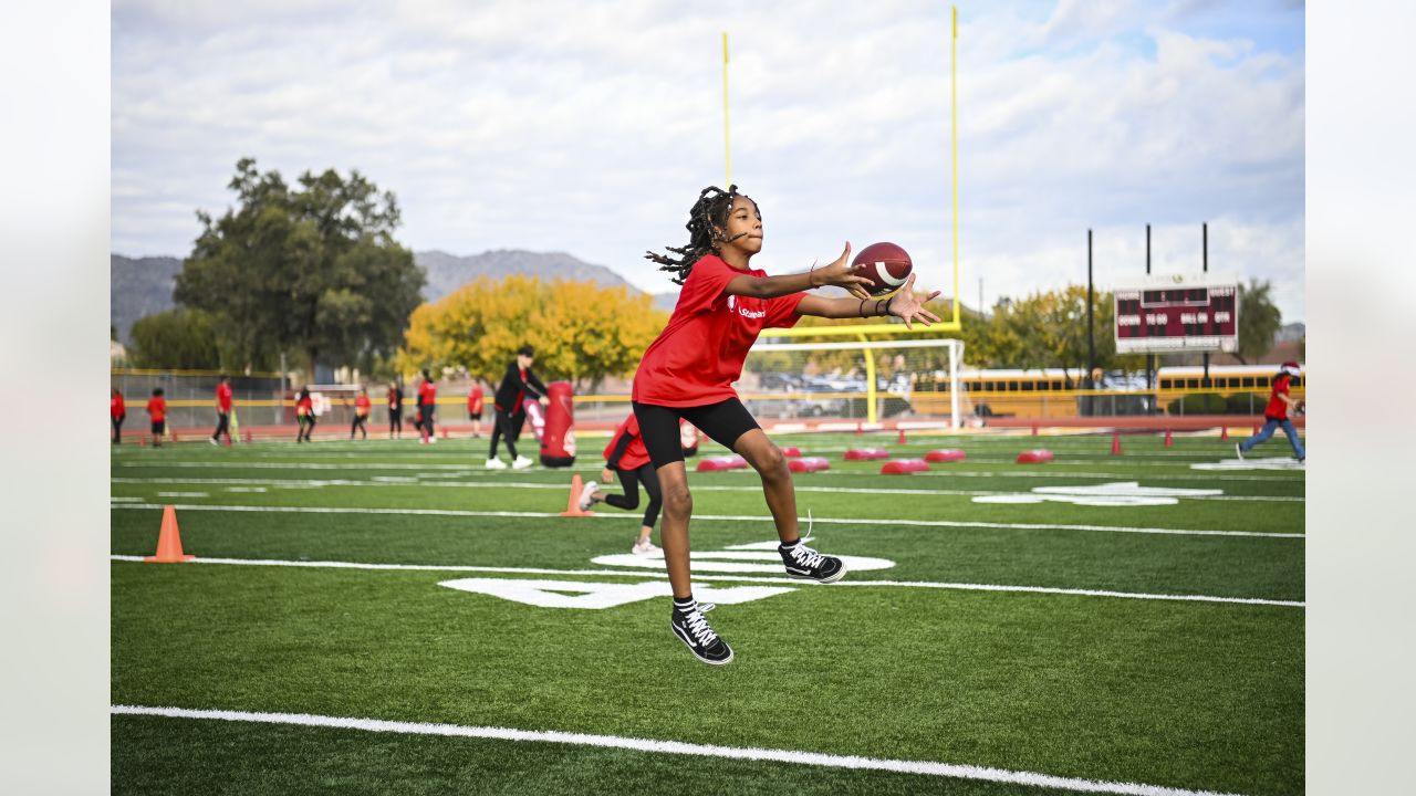 Arizona Cardinals offensive tackle Josh Jones, left, blocks Cardinals  linebacker Myjai Sanders (41) during NFL football training camp practice at  State Farm Stadium Monday, Aug. 7, 2023, in Glendale, Ariz. (AP Photo/Ross