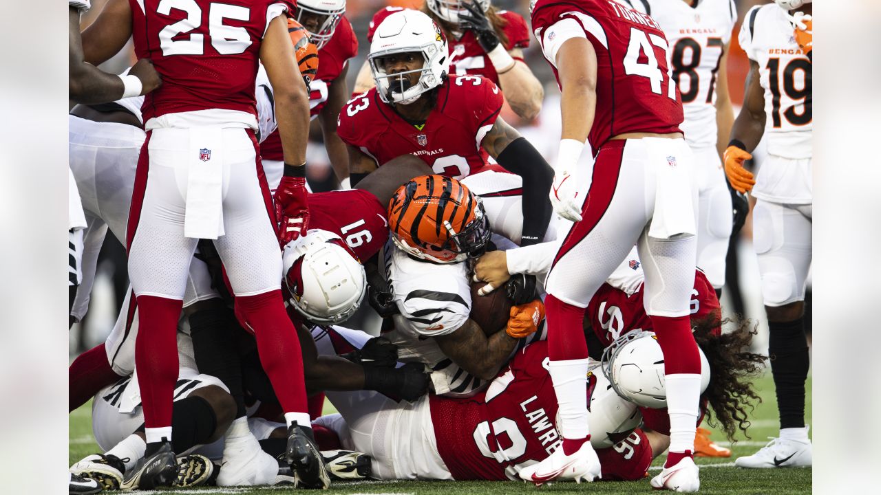 Arizona Cardinals defensive tackle Leki Fotu (95) looks up at a replay  during an NFL football game against the Cincinnati Bengals, Friday, Aug.  12, 2022, in Cincinnati. (AP Photo/Zach Bolinger Stock Photo - Alamy