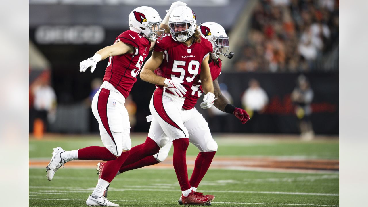 Arizona Cardinals defensive tackle Leki Fotu (95) looks up at a replay  during an NFL football game against the Cincinnati Bengals, Friday, Aug.  12, 2022, in Cincinnati. (AP Photo/Zach Bolinger Stock Photo - Alamy