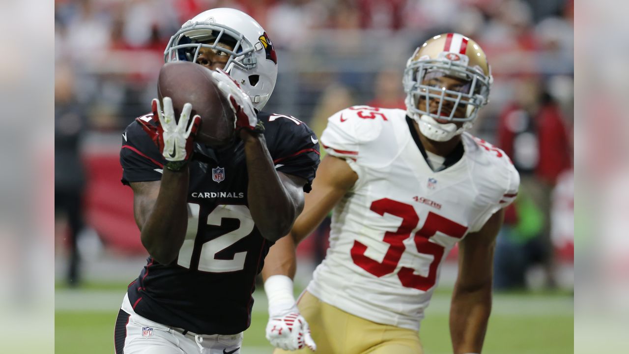 San Francisco 49ers Frank Gore looks up at the video screen after 49ers-Arizona  Cardinals game at the University of Phoenix Stadium in Glendale, Arizona on  September 21, 2014. The Cardinals defeated the