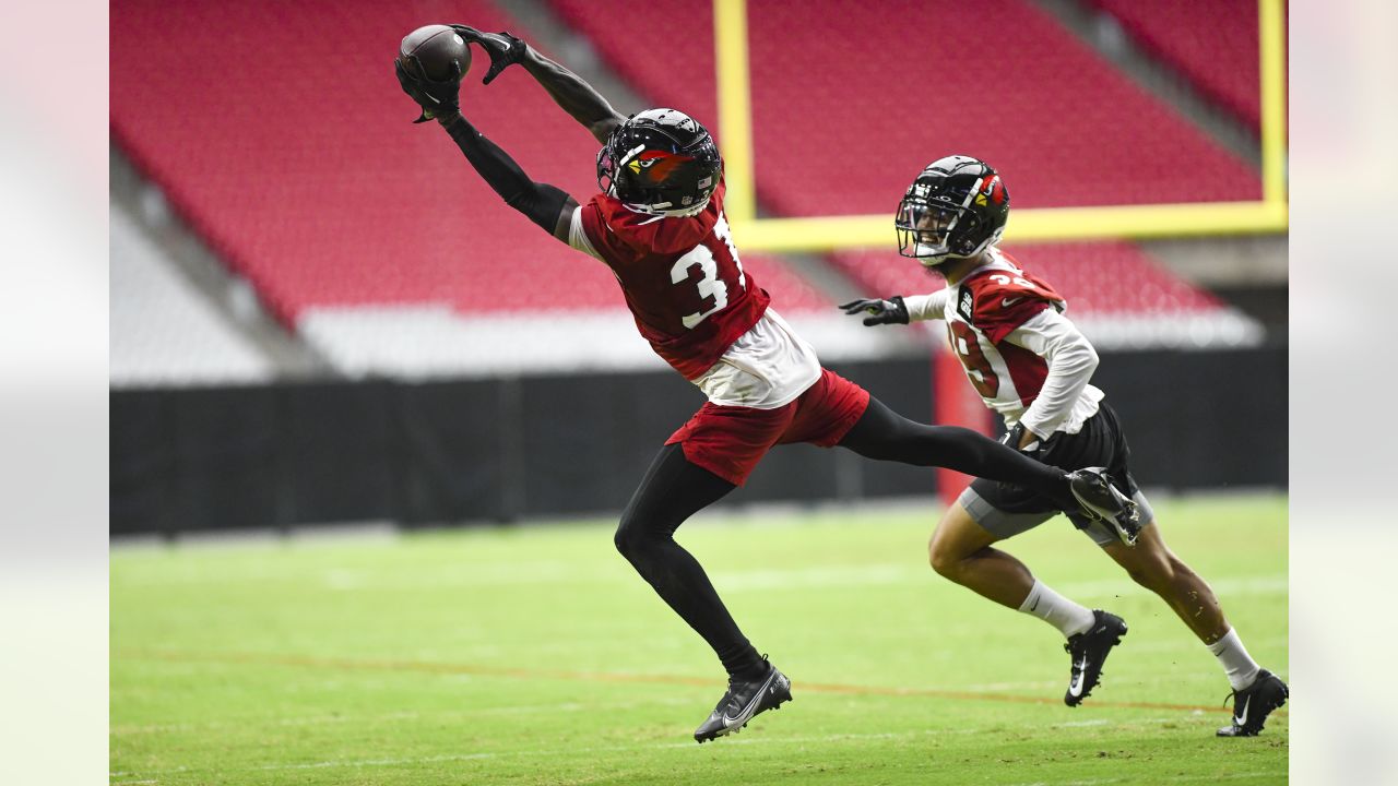 Arizona Cardinals' Greg Dortch returns the opening kickoff against