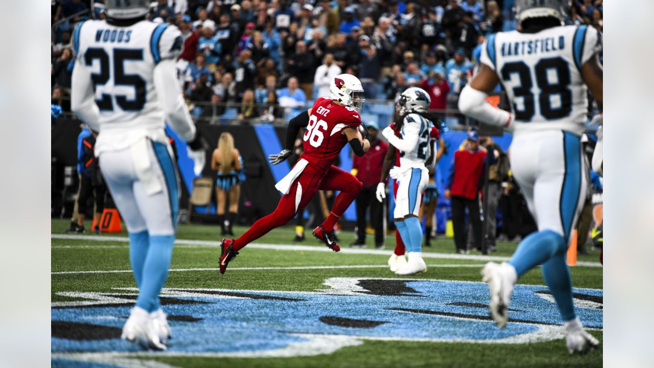 The Cardinals Flag Runners sprint on to the field prior to an NFL football  game between the Arizona Cardinals and Carolina Panthers, Sunday, Nov. 14,  2021, in Glendale, Ariz. (AP Photo/Ralph Freso