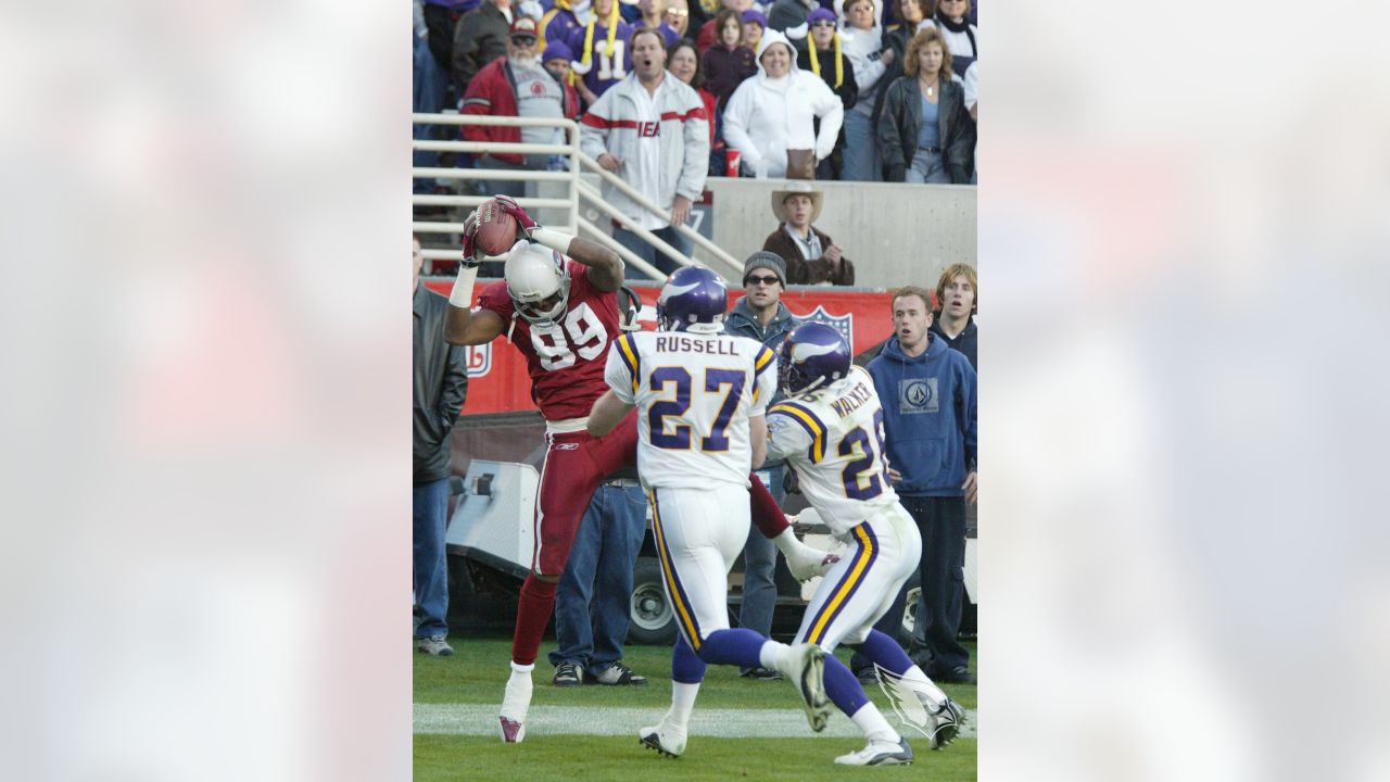 December 21, 2003: Arizona Cardinals Emmitt Smith looks for the handoff  from Josh McCown as Seattle