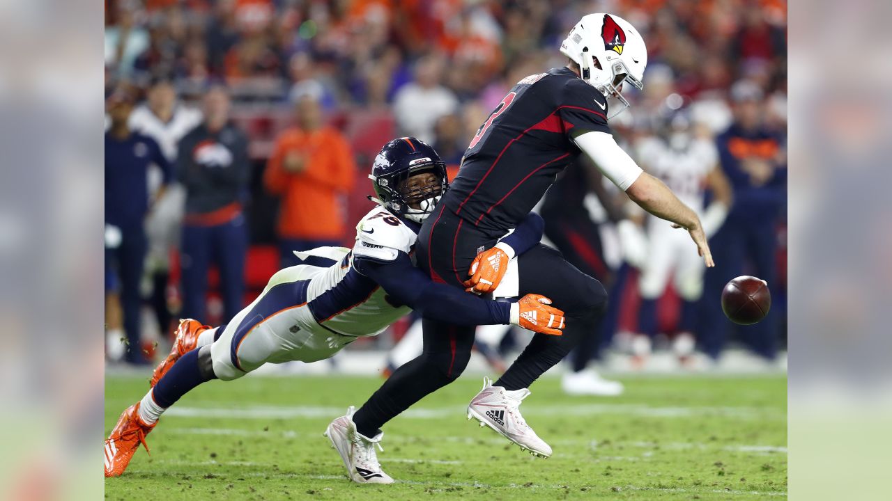 FILE – In this Sunday, Sept. 9, 2018, file photo, Seattle Seahawks  quarterback Russell Wilson loses the ball as he is hit by Denver Broncos  linebacker Von Miller (58) during the first