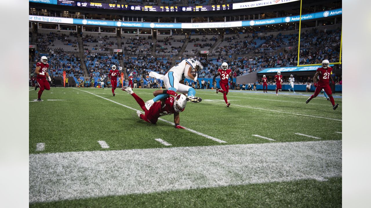 The Cardinals Flag Runners sprint on to the field prior to an NFL football  game between the Arizona Cardinals and Carolina Panthers, Sunday, Nov. 14,  2021, in Glendale, Ariz. (AP Photo/Ralph Freso