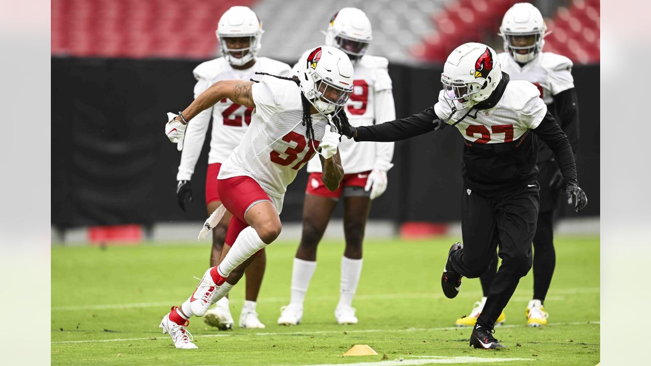 Arizona Cardinals wide receiver Davion Davis runs a passing route during  NFL football training camp practice at State Farm Stadium Saturday, July 29,  2023, in Glendale, Ariz. (AP Photo/Ross D. Franklin Stock