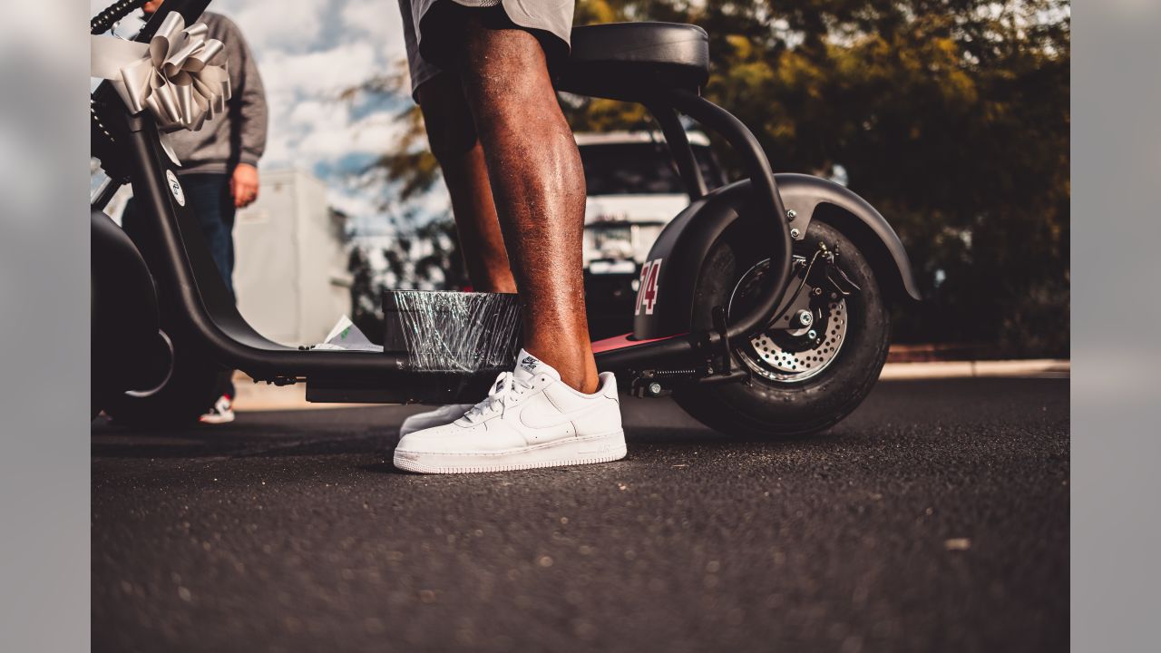 Cardinals offensive linemen receive motorized scooters as gifts