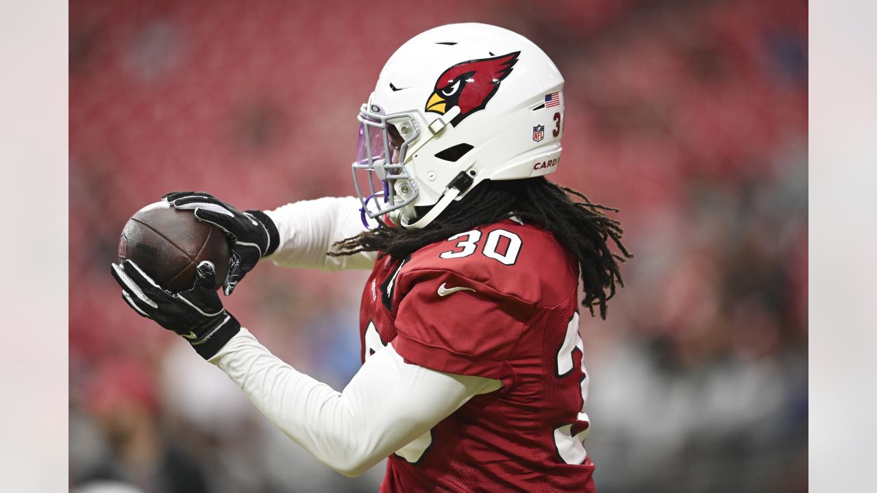 Arizona Cardinals offensive tackle Josh Jones, left, blocks Cardinals  linebacker Myjai Sanders (41) during NFL football training camp practice at  State Farm Stadium Monday, Aug. 7, 2023, in Glendale, Ariz. (AP Photo/Ross