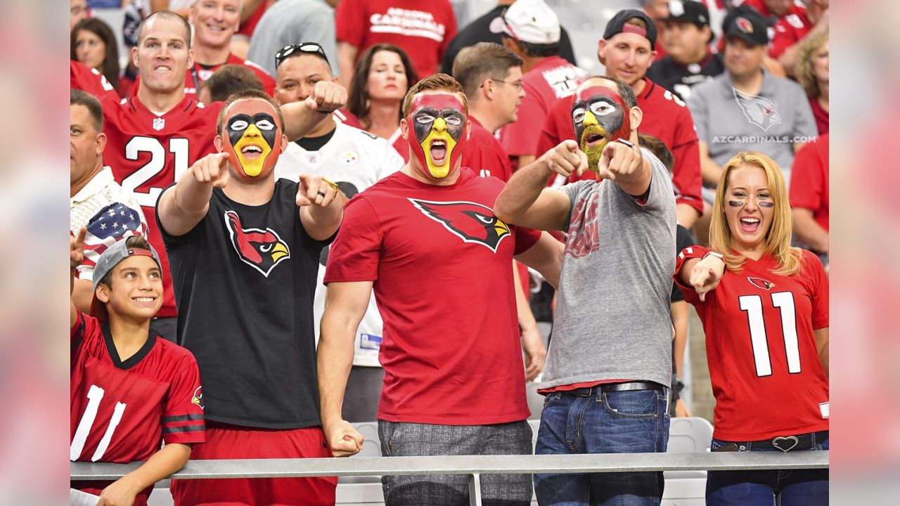 New England Patriots vs. Arizona Cardinals . Fans support on NFL Game.  Silhouette of supporters, big screen with two rivals in background Stock  Photo - Alamy