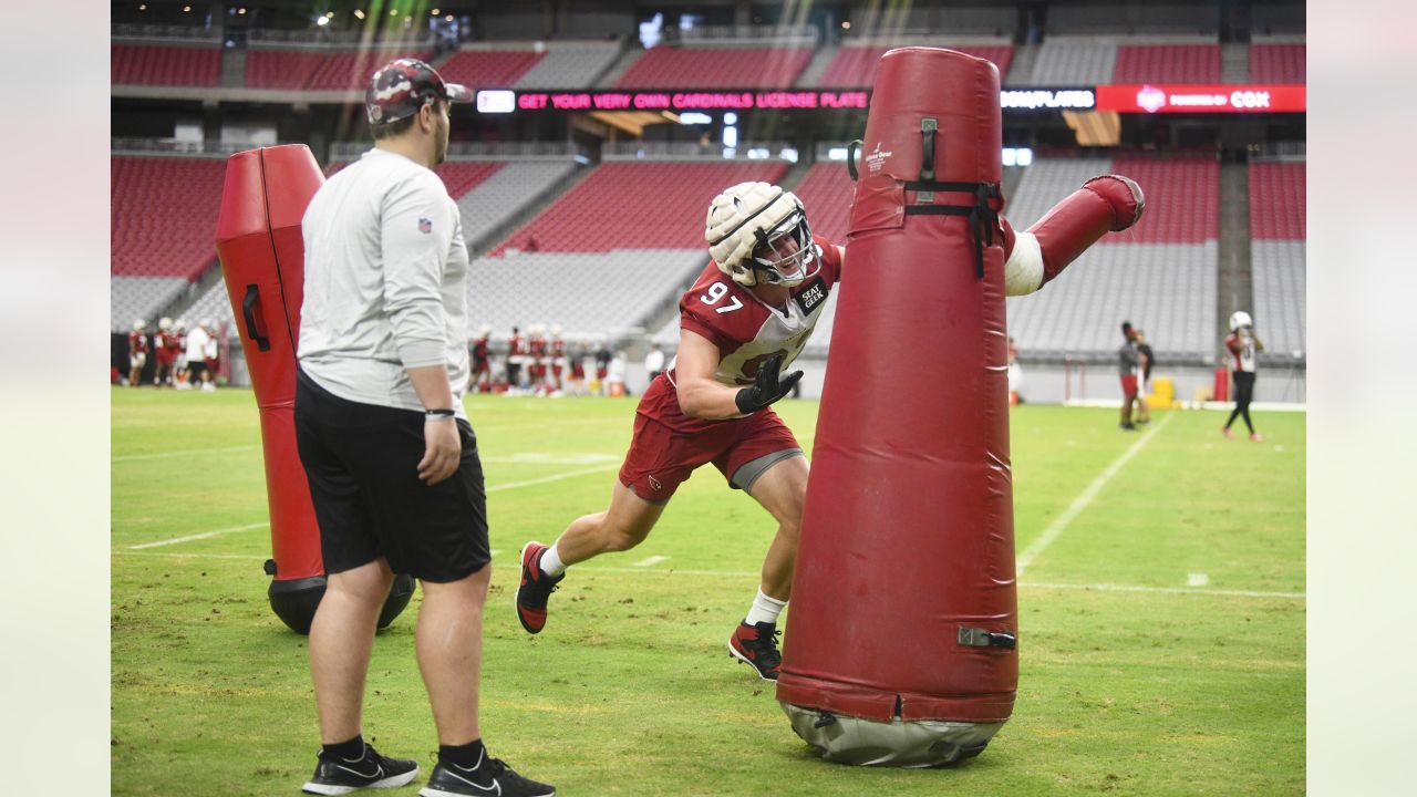 Arizona Cardinals wide receiver Rondale Moore pauses on the sideline during  mini camp practice at the team's NFL football training facility Tuesday,  June 13, 2023, in Tempe, Ariz. (AP Photo/Ross D. Franklin