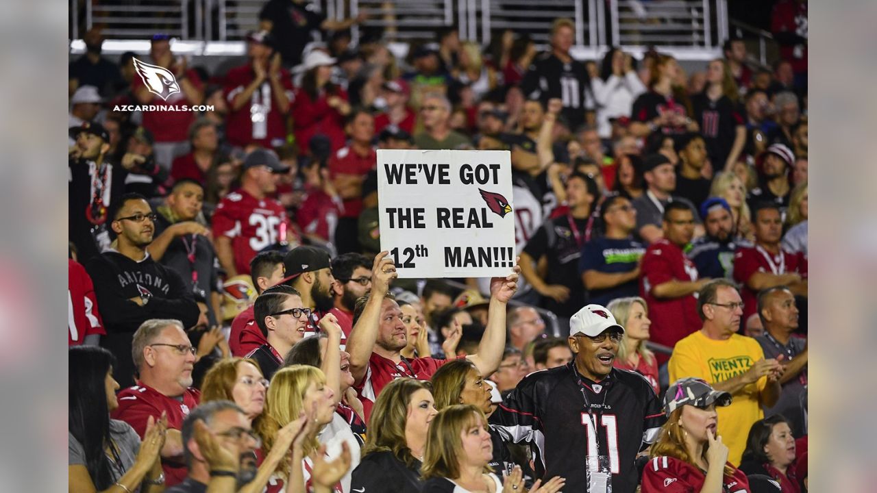 New England Patriots vs. Arizona Cardinals . Fans support on NFL Game.  Silhouette of supporters, big screen with two rivals in background Stock  Photo - Alamy