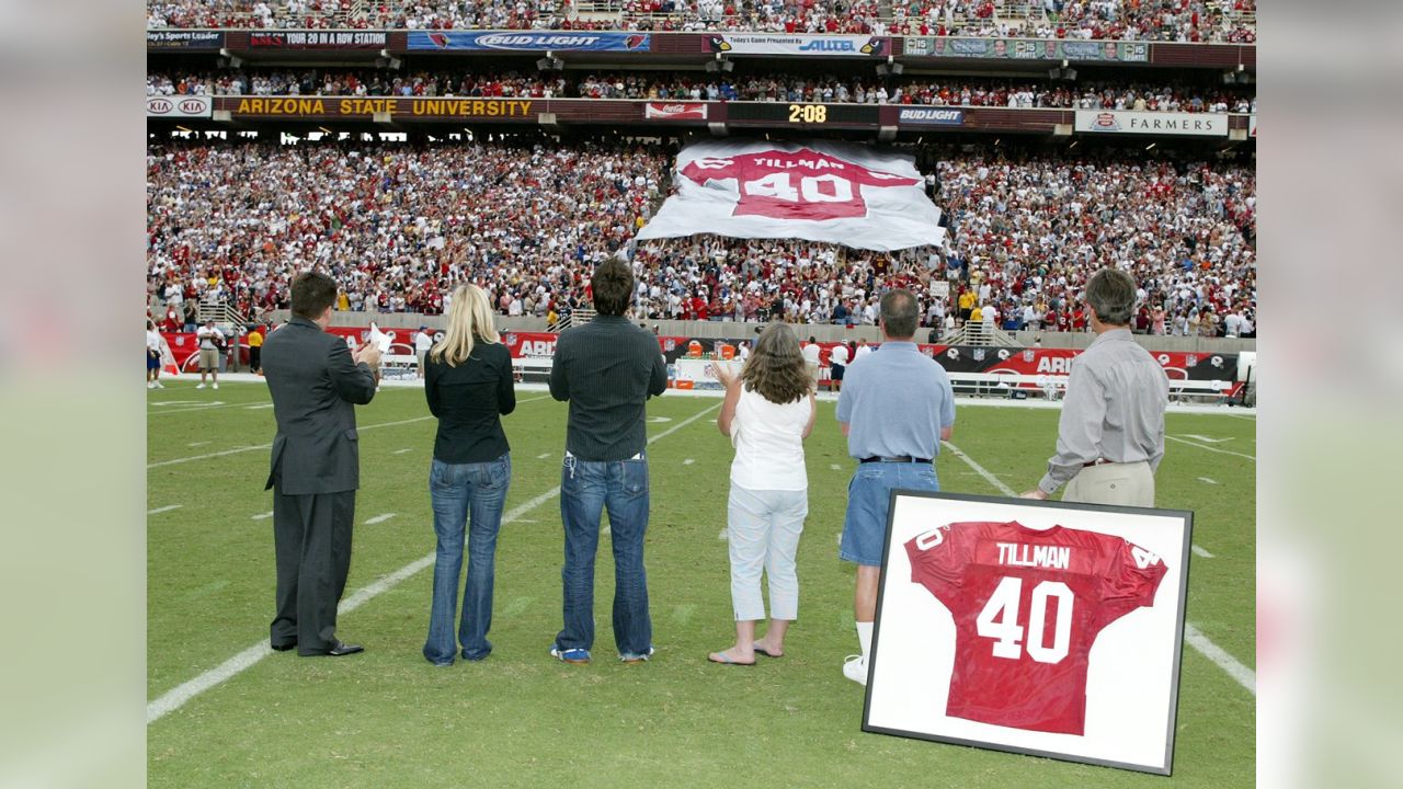 Sept. 12, 2011 - Chandler, Arizona, U.S - A statue of Arizona Cardinals Pat  Tillman is surrounded by white roses before a NFL game against the Carolina  Panthers at University of Phoenix