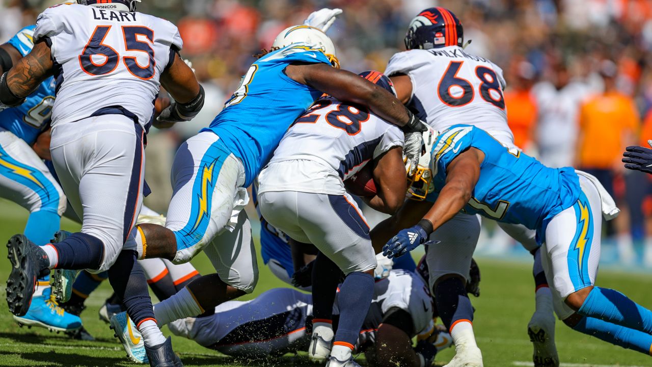 Denver Broncos vs. Los Angeles Chargers. Fans support on NFL Game.  Silhouette of supporters, big screen with two rivals in background Stock  Photo - Alamy