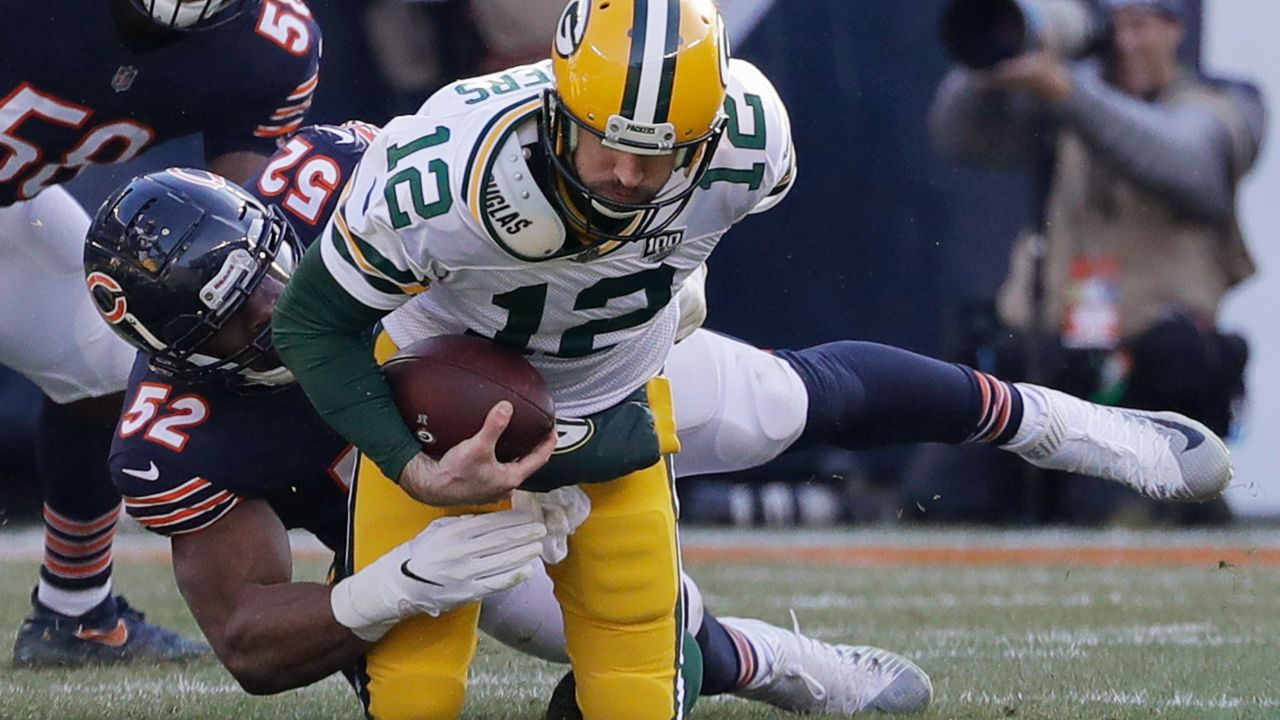 Chicago Bears outside linebacker Leonard Floyd (94) celebrates after  sacking Green Bay Packers quarterback Aaron Rodgers (12) during the second  half of an NFL football game Sunday, Dec. 16, 2018, in Chicago. (