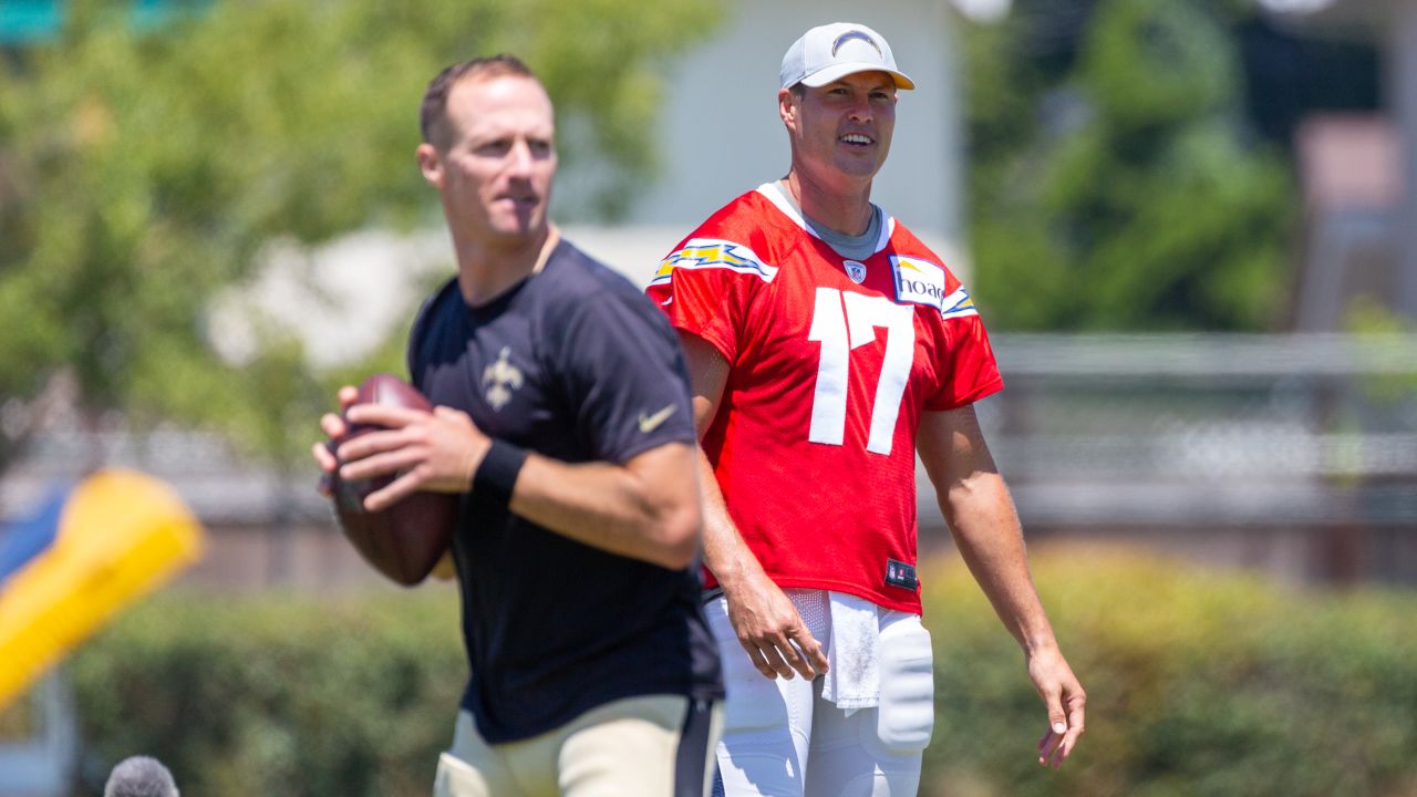 ADVANCE FOR WEEKEND EDITIONS JAN. 19-21 ** FILE ** Quarterback Philip  Rivers holds up his San Diego Chargers jersey at a news conference at the  Chargers' facility in San Diego in