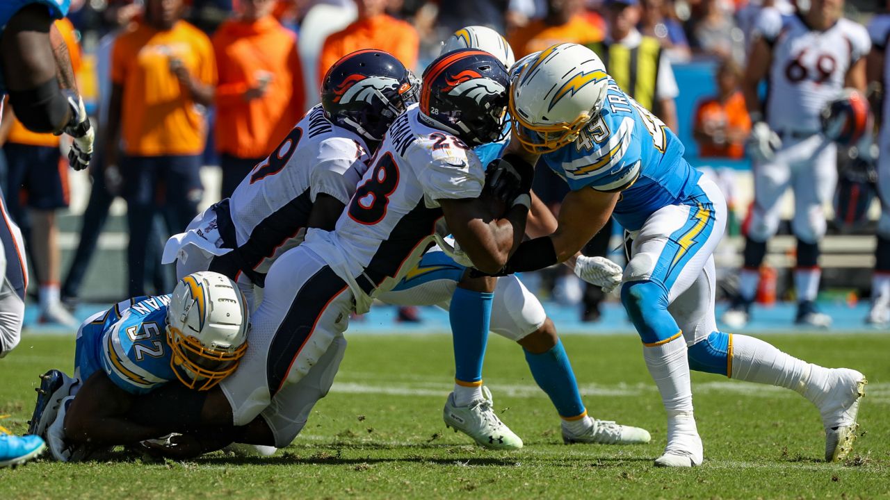 Los Angeles Chargers vs. Denver Broncos . Fans support on NFL Game.  Silhouette of supporters, big screen with two rivals in background Stock  Photo - Alamy