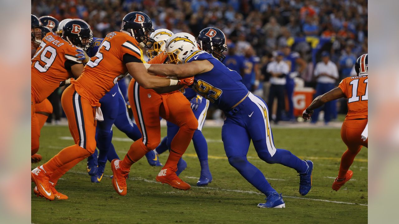 San Diego Chargers defensive end Joey Bosa (99) works against Denver  Broncos tight end John Phillips during the second half of an NFL football  game Thursday, Oct. 13, 2016, in San Diego. (