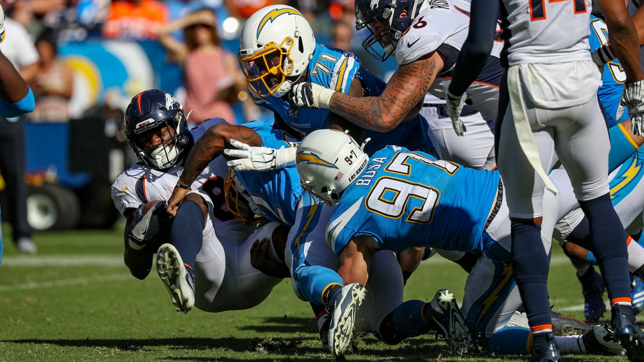 Denver Broncos vs. Los Angeles Chargers. Fans support on NFL Game.  Silhouette of supporters, big screen with two rivals in background Stock  Photo - Alamy